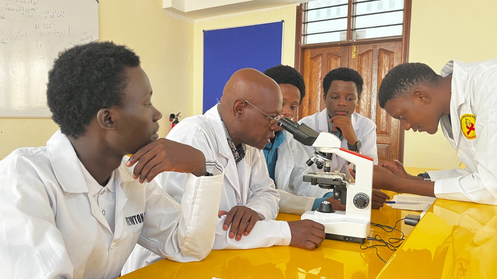 Medicine students with lecturer during practicals